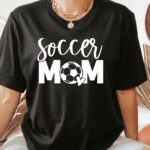 Soccer Mom T-Shirt - Are you a Big Fan of Sports? Show off your favourite Sports Team or Sports quote by wearing one of our Sport themed T-Shirts.
